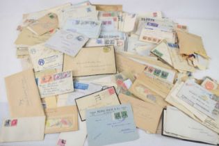 A large collection of stamped envelopes, Victorian and later, together with a small quantity of