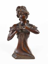 A French bronze early 20th century bust titled Marguerite, 25cm high.