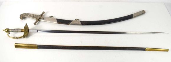 An Ottoman sabre and scabbard together with a French type court sword with brass and leather