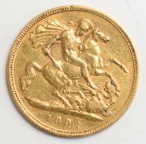 A Queen Victoria gold half sovereign dated 1894.