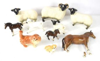 A group of ceramic animals to include examples by Sylvac, Coopercraft and Beswick.