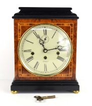 A Kieninger burr walnut cased mantel clock with eight day Kieninger spring-driven movement,