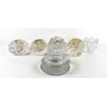 Five pressed glass tealight holders, to include a 'Snowball' and a 'bubble' effect Orrefors example,