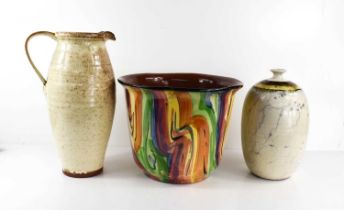 The Royal Torquay Potteries jardiniere in multicolours, a jug by Tessa Buckley, and a further vase