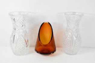 A pair of large cut glass vases and a mid-century amber coloured example, 17cm high.