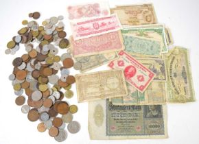 A collection of GB and worldwide coinage, some silver, together with a group of banknotes.