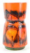 A Poole Pottery Delphis vase decorated in a orange and red glaze by Anne Godfrey, 23cm high.