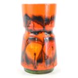 A Poole Pottery Delphis vase decorated in a orange and red glaze by Anne Godfrey, 23cm high.