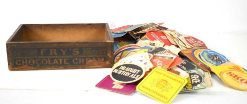 An antique "Fry’s Chocolate Cream" pine display counter box together with a group of vintage beer