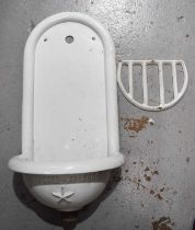 A French pissoir, embossed 'Mu Depose Bde SGDG', enamelled in white, 80cm high.