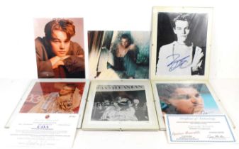 Five Leonardo DiCaprio signed photographs, two with certificates, together with a signed Tim Curry