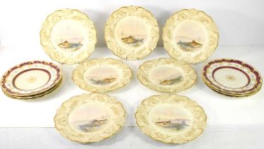 A group of seven handpainted plates decorated with Salmon swimming in the river, late 19th