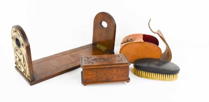 An Edwardian mahogany and brass book slide, a 1920s continental puzzle box with carved decoration,