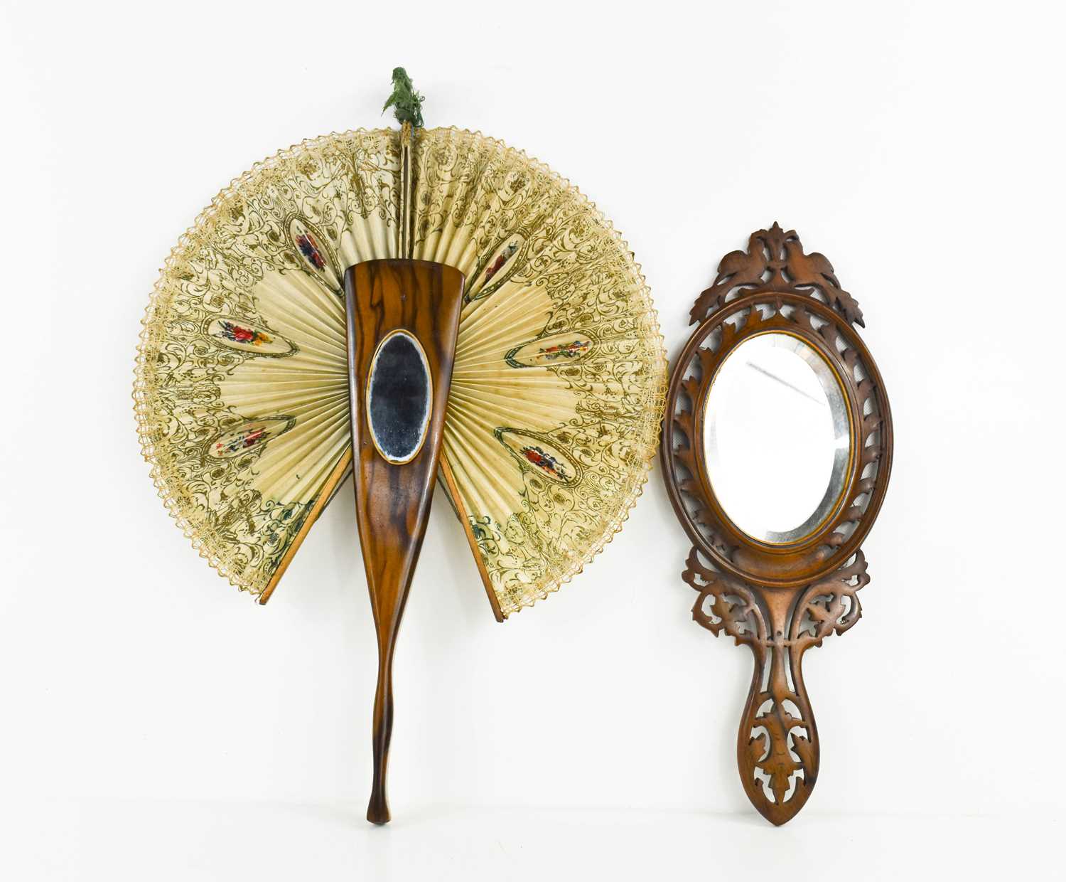 A 19th century treen hand carved hand mirror, likely continental, with marquetry inlaid oval - Image 2 of 2