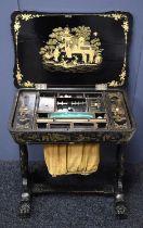 A 19th century Chinoiserie black lacquered sewing table, decorated all over with figural scenes, and