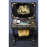 A 19th century Chinoiserie black lacquered sewing table, decorated all over with figural scenes, and