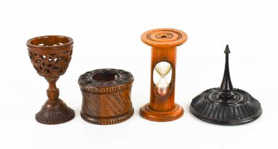 A group of 19th century treen to include an inkwell, carved all over with repeating spirals to the