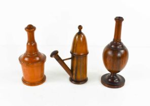 A 19th century olive wood etui, in the form of a watering can, with domed cover, and removable