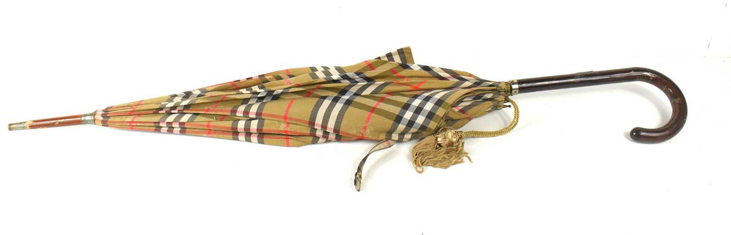 A vintage Burberry parasol, Burberrys brass plate to the handle.