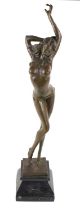 After Alda Vitaleh (20th century): a bronze semi-nude female, modelled in stilettos with one arm