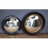 Two Regency style convex circular wall mirrors, 53cm diameter.