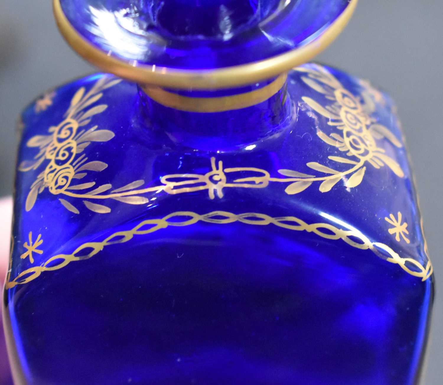 A Victorian cobalt blue glass ships decanter, a similar pair of bottles with stoppers, two glass - Image 3 of 7