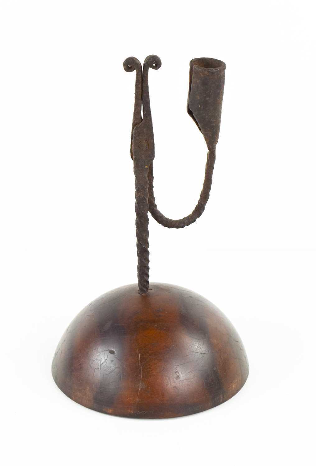 A treen and wrought iron early 19th century rushnip, the candle socket and nip raised on a domed