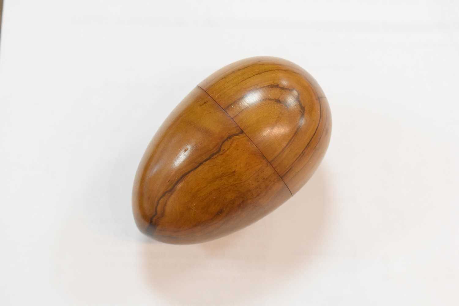 A group of treen sewing aids, to include a 19th century olive wood darning egg form etui, a childs - Image 3 of 14
