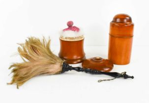 A 19th century ebony handled feather duster, together with a treen powder puff box with cover inlaid