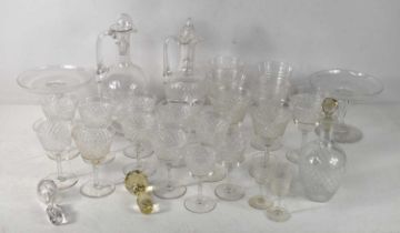 A group of crystal glasses and decanters, diamond pattern, to include wine and sherry glasses,