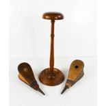 Two French Victorian wig duster bellows together with a treen wig stand 27cm high.