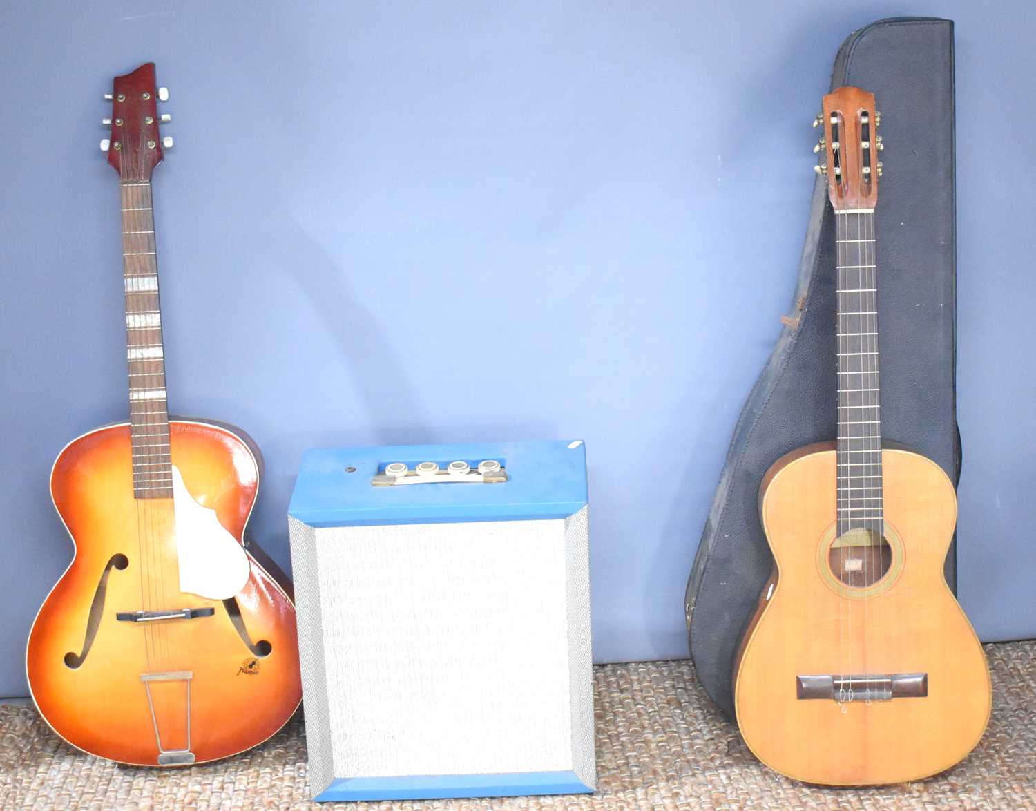 A vintage Framus acoustic guitar together with a Carlos Guermantes classical / acoustic guitar in