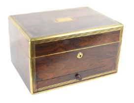 A 19th century rosewood vanity case, the fitted interior lined with red velvet, and housing silver