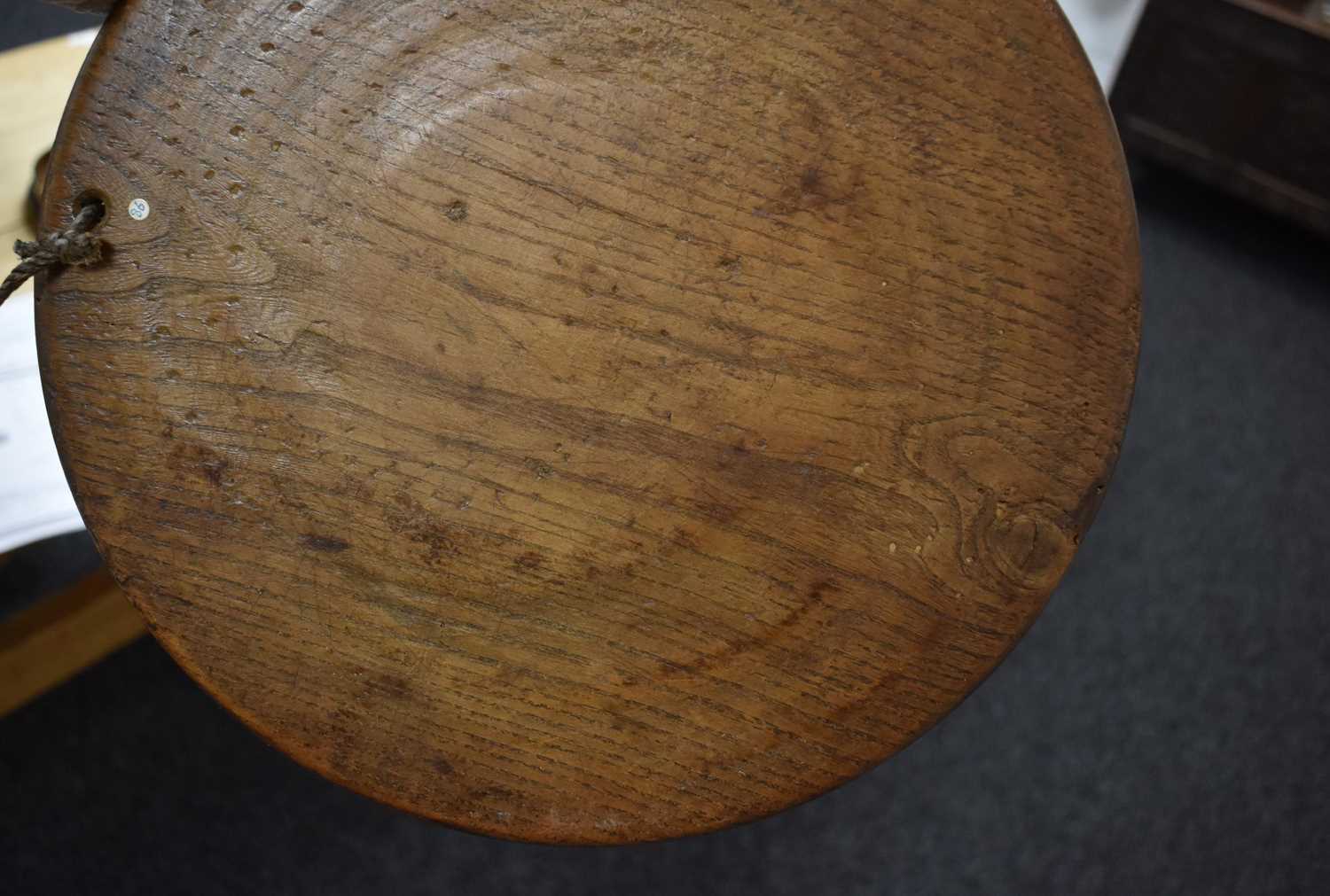 A 19th century or earlier lignum vitae wine salver, 22cm diameter, together with an 18th century oak - Image 2 of 8