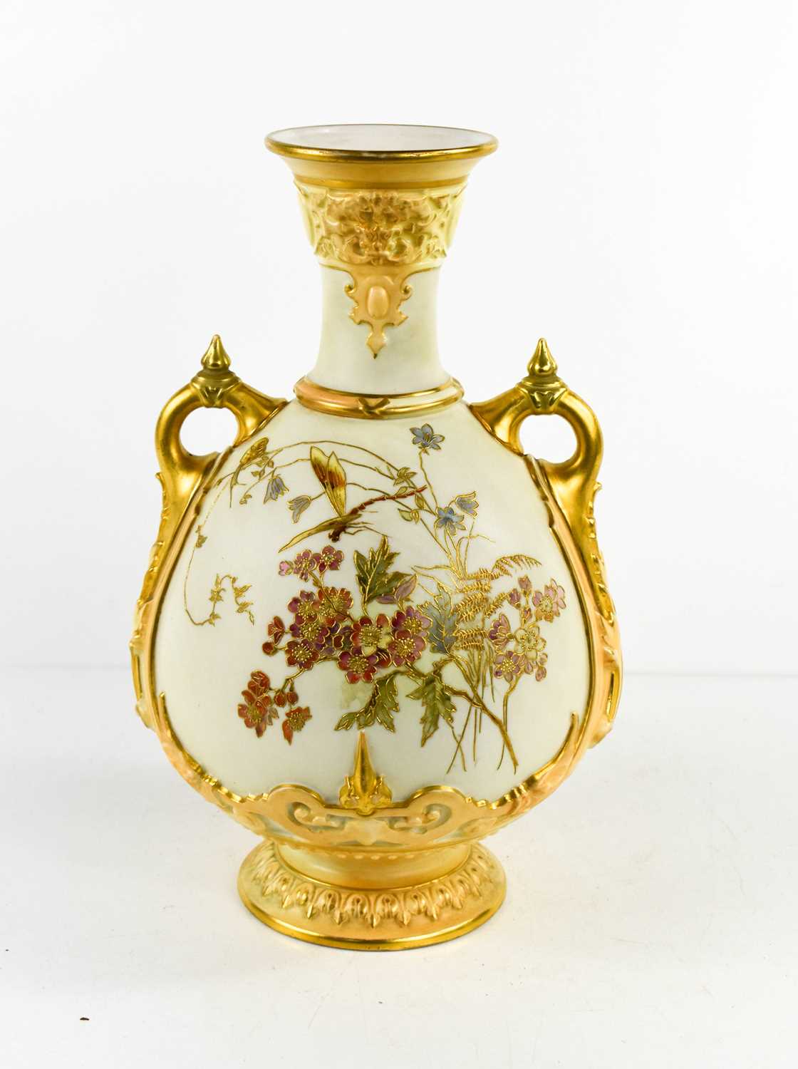 A Royal Worcester blush ivory vase, decorated with a dragonfly, model number 1553, puce marks for