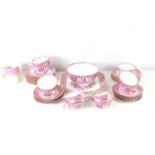 A 19th century part tea set, pink primrose pattern, cups, saucers, sugar bowl and plates.