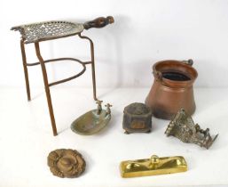 A Georgian pierced brass trivet together with a copper pot, a Georgian lead tobacco jar, a brass