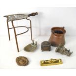 A Georgian pierced brass trivet together with a copper pot, a Georgian lead tobacco jar, a brass