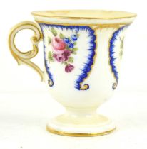 An early 19th century French sorbet cup, manner of Sevres, painted with flowers in blue panels, C