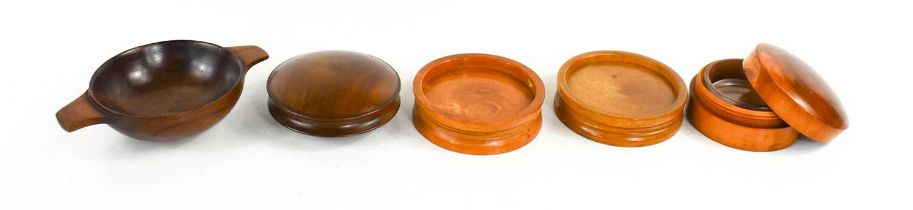 Two 19th century treen pill shapers, a pill box and cover with glass liner and cork lined inside