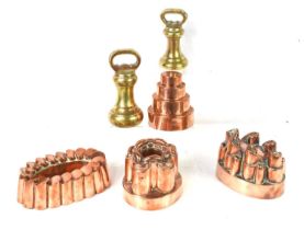 A group of four Victorian copper jelly moulds, two with Benham & Froud stamp, together with two