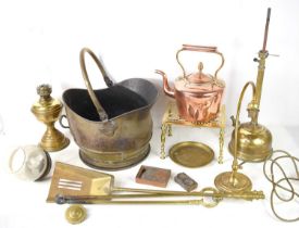A Group of metalware to include a Georgian pierced brass trivet, a brass coal scuttle, fire irons,
