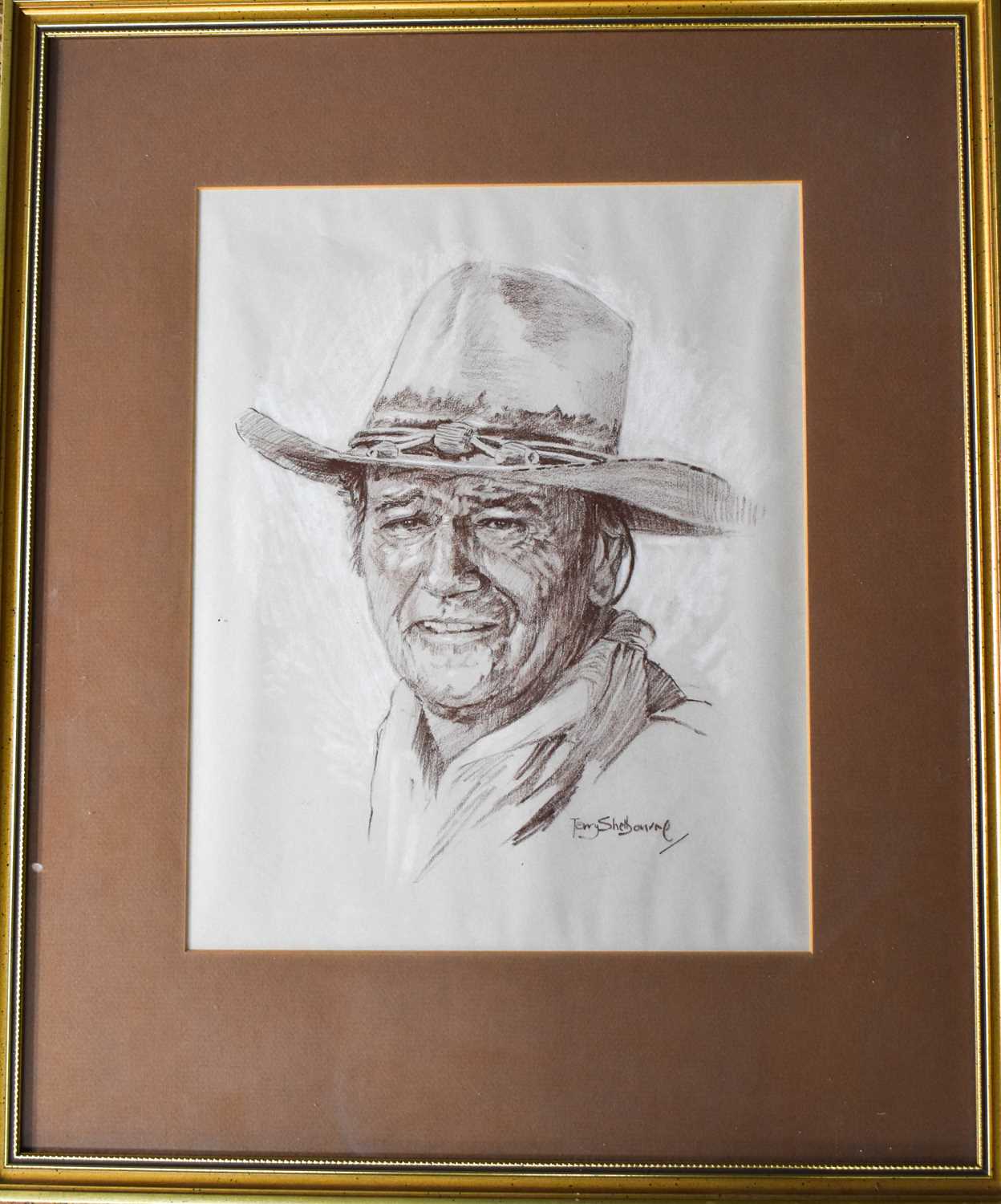 Terry Sherbourne, portrait of John Wayne, pastel & white chalk, 34 by 28cm.