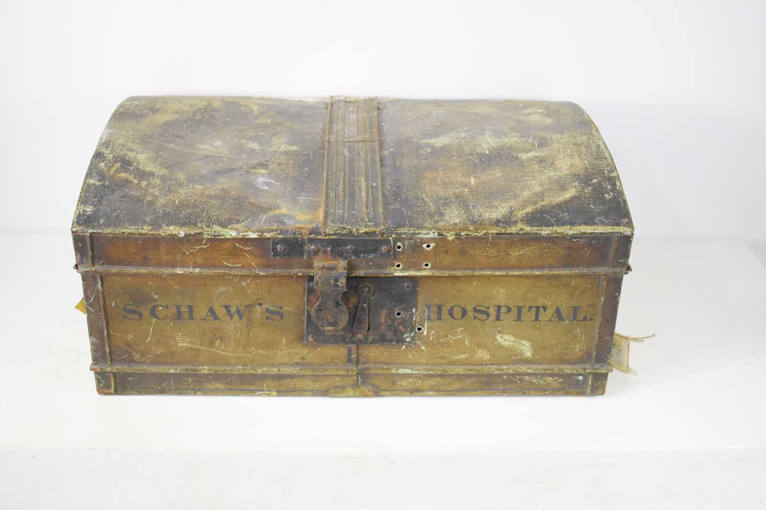 An antique Schaw's Hospital metal trunk with iron handles and lock, 60cm wide by 28cm high. [