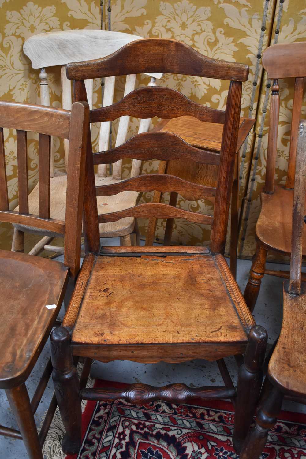 A harlequin set of five elm kitchen chairs, an oak jadiniere stand and a 19th century elm ladderback - Image 2 of 2