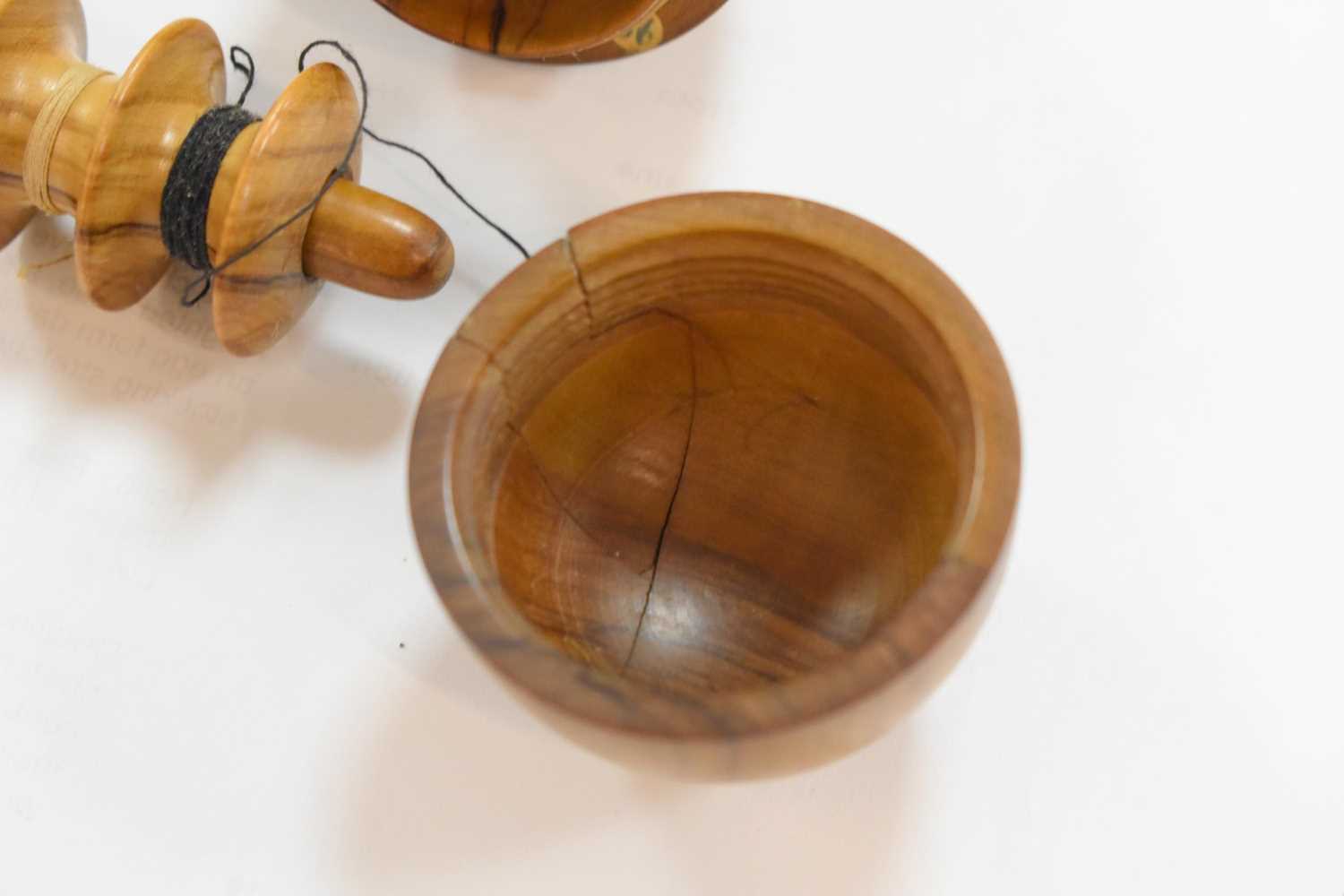 A group of treen sewing aids, to include a 19th century olive wood darning egg form etui, a childs - Image 6 of 14
