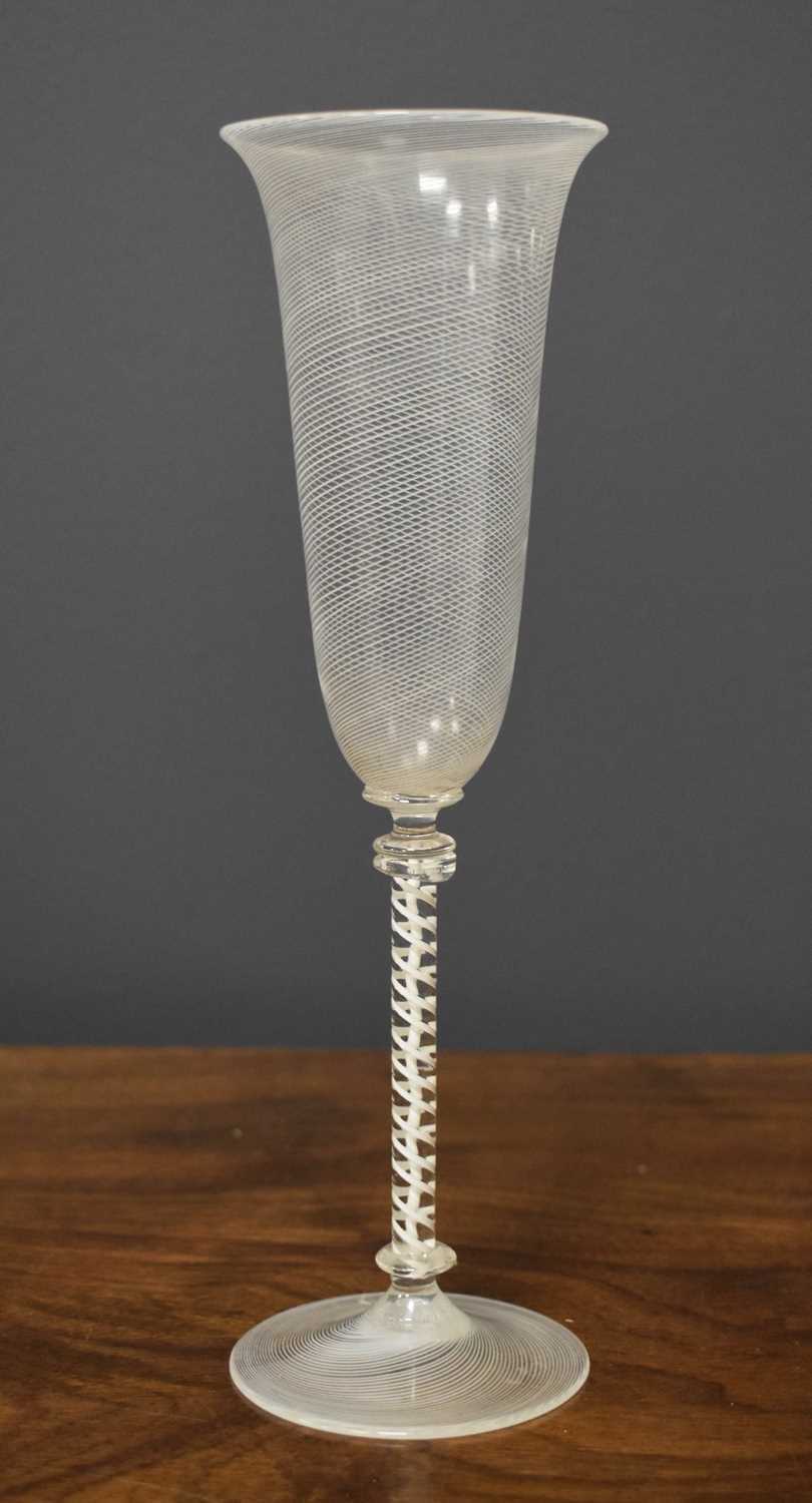 An unusual Edwardian Champagne flute in the 18th century manner, with milk glass twisted bowl,