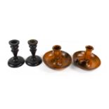 A pair of late 18th / early 19th century lignum vitae candle holders, with screw on candle