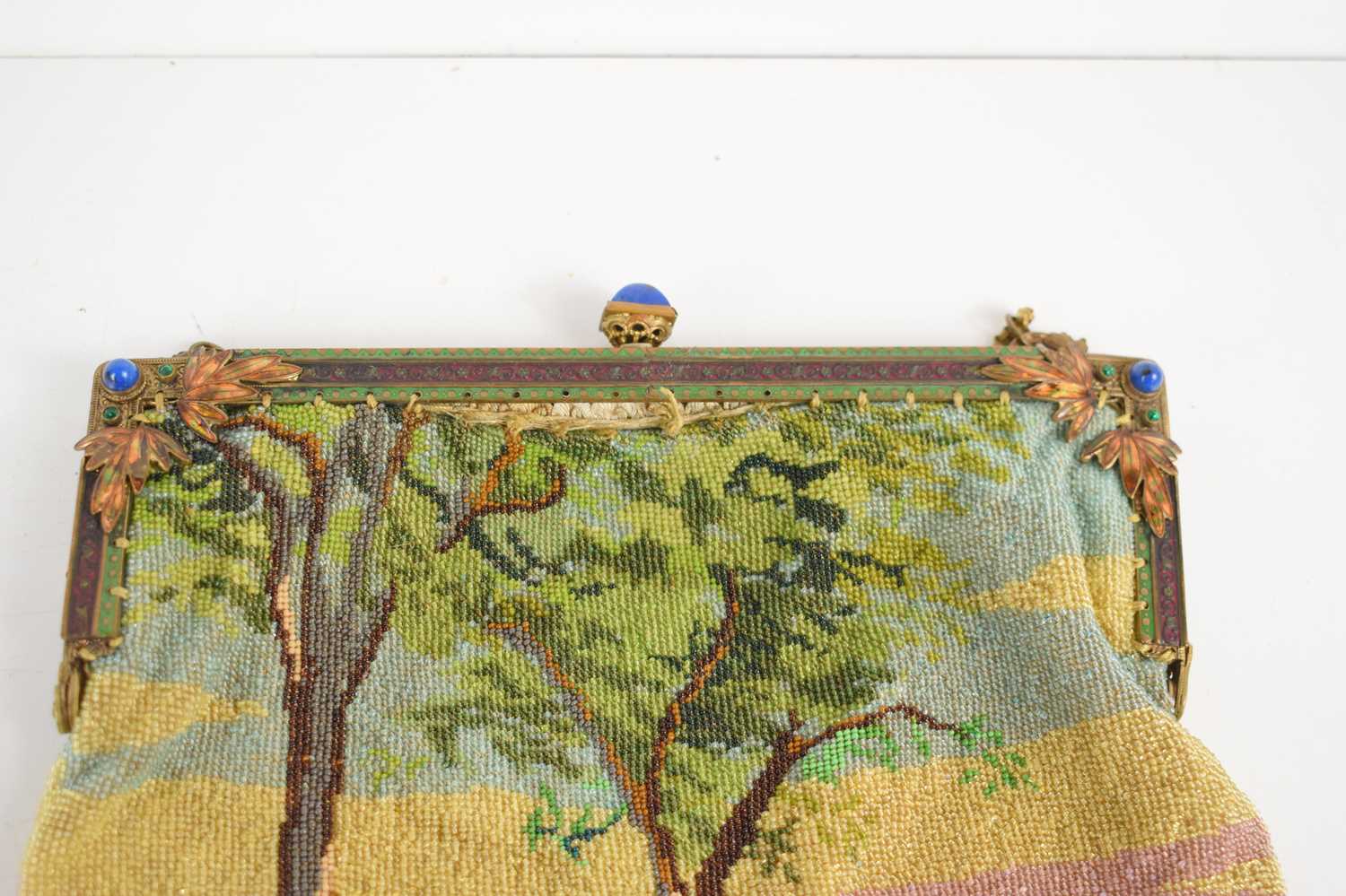 An antique micro beaded ladies purse, depicting a courting couple sat under a tree, the gilt metal - Image 2 of 2