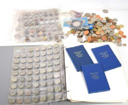 A collection of GB and worldwide coins, some silver to include florins and shillings and some